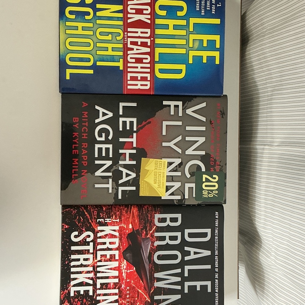 Set of Three Thriller Novels by Lee Child, Vince Flynn, and Dale Brown.